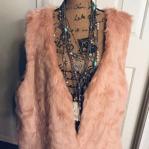 Forever 21 pink Fur vest. Never worn!